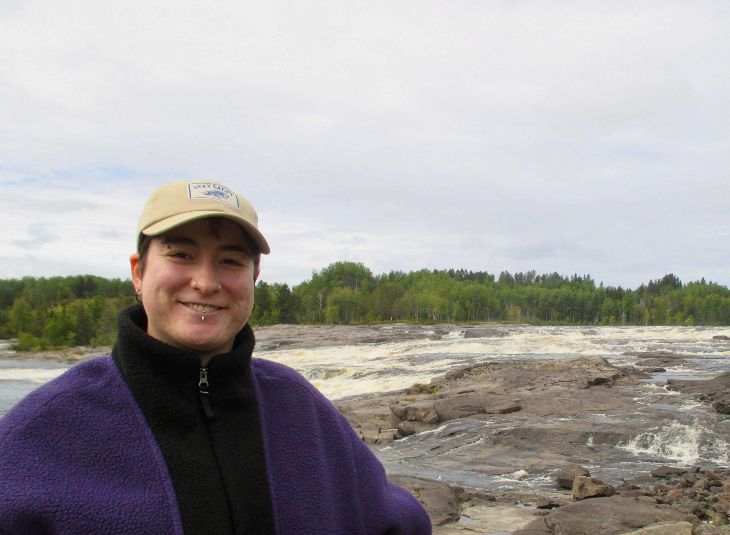 Celeste Henderson headshot with chutes scenery in the background.